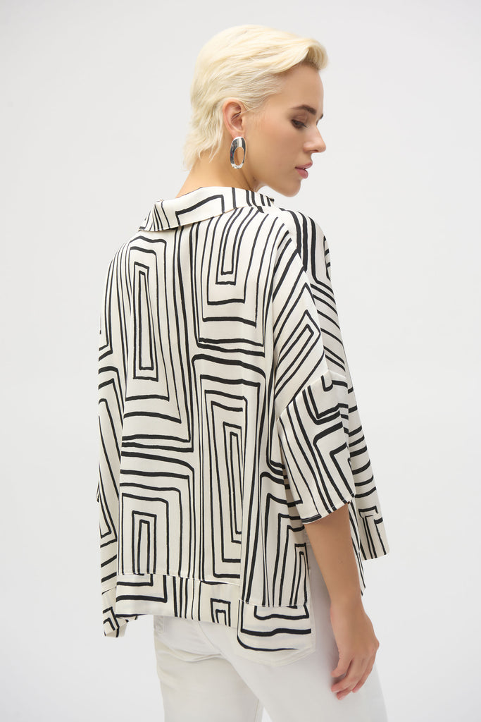 Back view of top showing print and banded hem