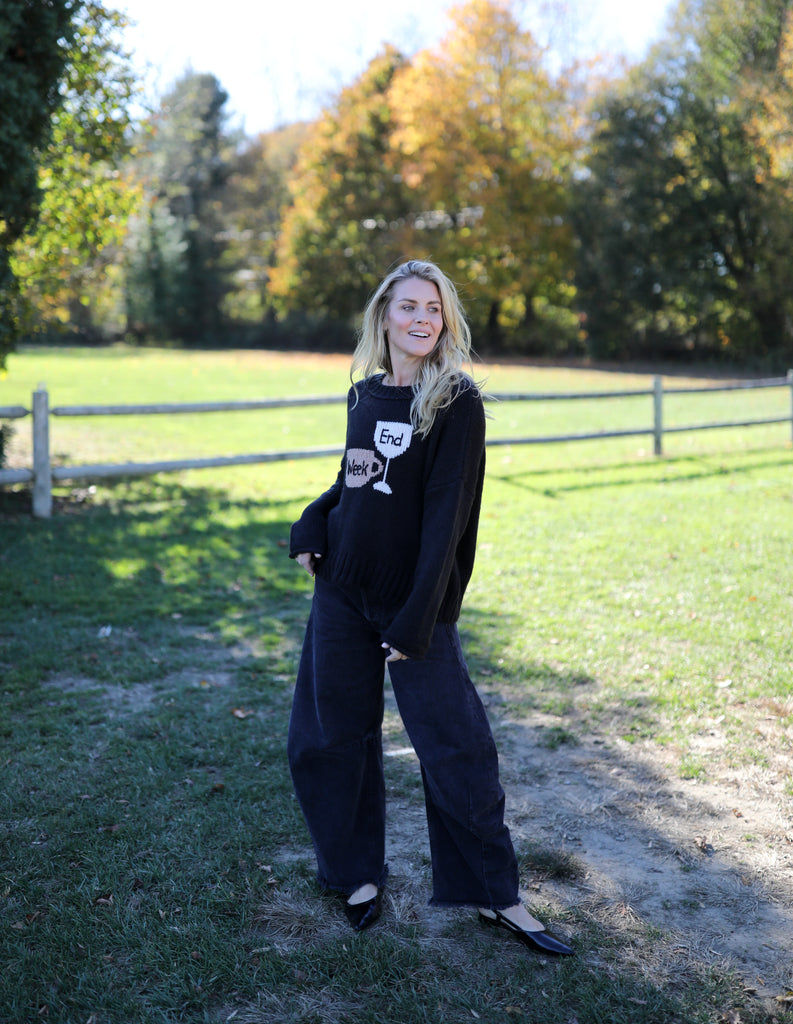 Chunky knit sweater with playful “Week” and “End” design