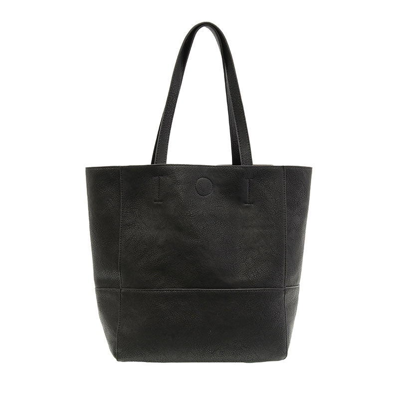Black Faith Raw Edge Tote; soft vegan leather, raw edges & roomy design—curated just for you by Daisy Jane’s.
