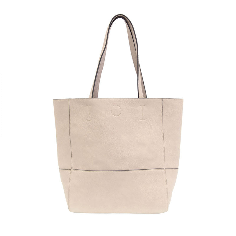 Bone Faith Raw Edge Tote; soft vegan leather, raw edges & roomy design—curated just for you by Daisy Jane’s.