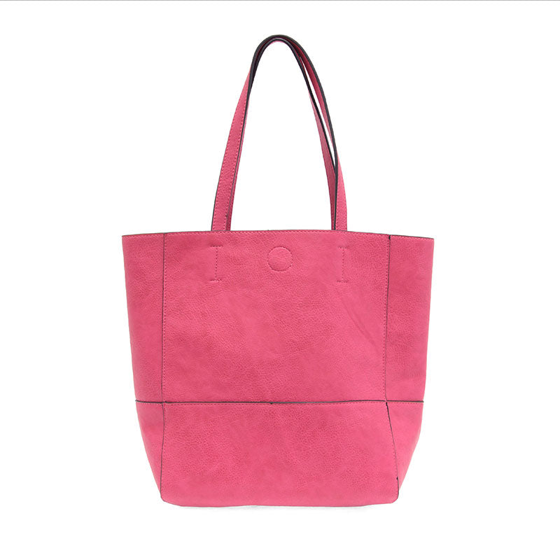 Magenta Faith Raw Edge Tote; soft vegan leather, raw edges & roomy design—curated just for you by Daisy Jane’s.