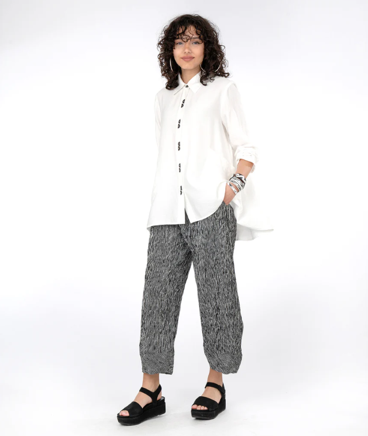 Elegant and versatile top by Niche in soft rayon blend