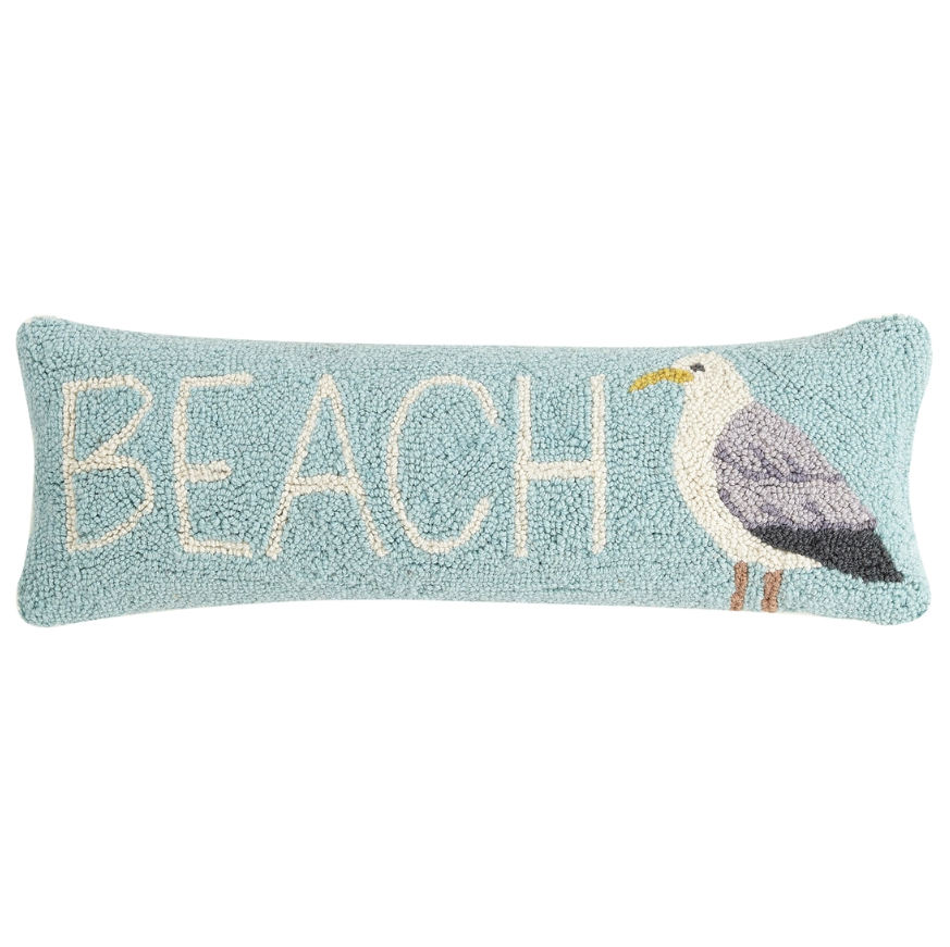 Coastal lumbar pillow with “Beach” text and seagull design