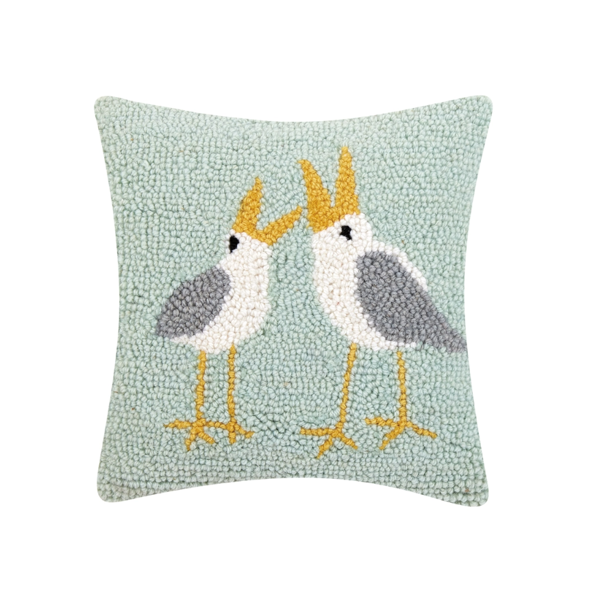 Square wool accent pillow featuring playful seagulls