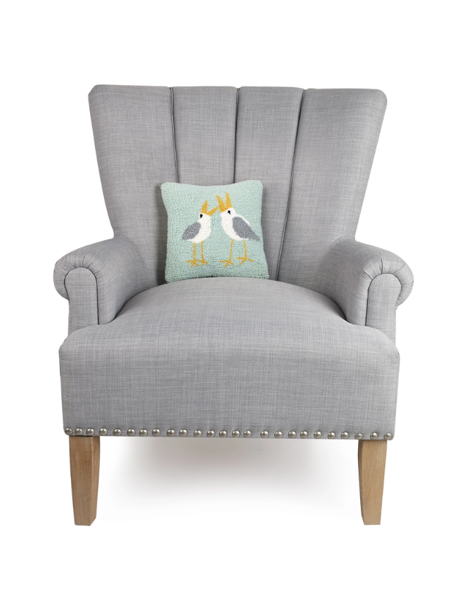 Small coastal pillow with hand-hooked seagull motif