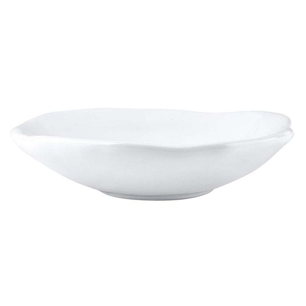 Side angle of heart bowl styled on a kitchen counter