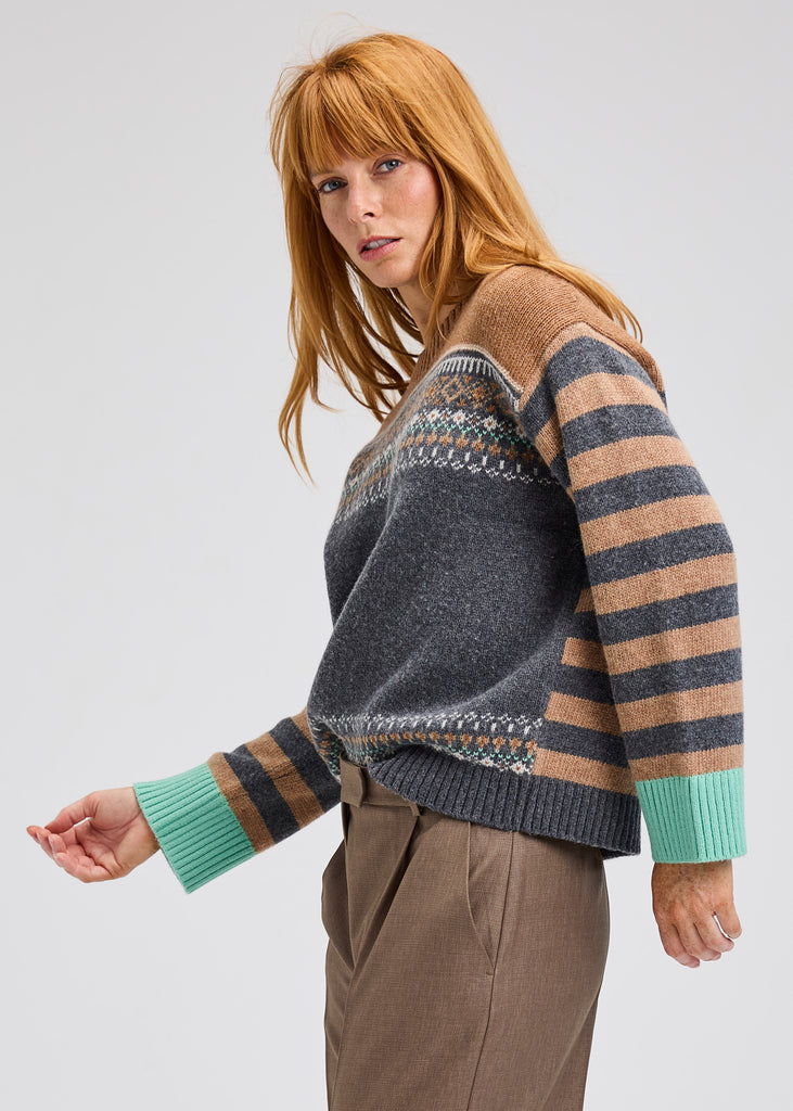 Model wearing boxy Fairisle Sweater in colorful fall tones