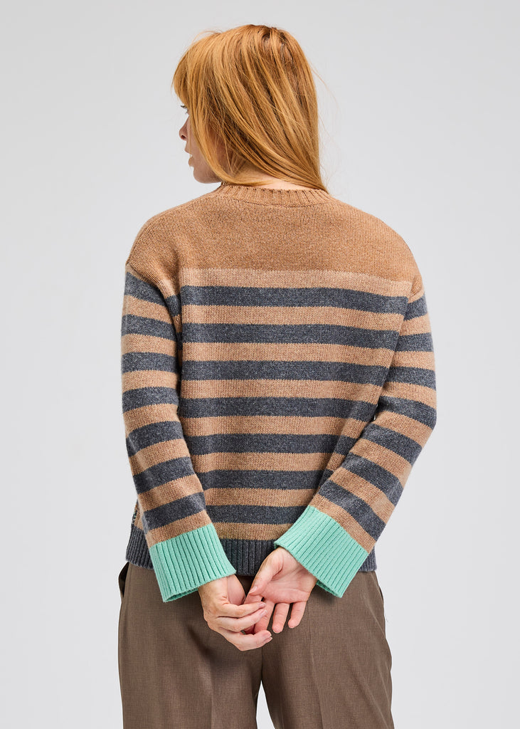 Soft knit sweater with contrasting patterns and crew neckline