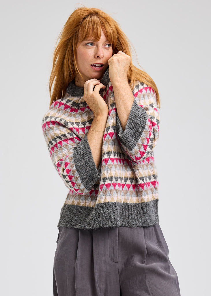 Cozy fall sweater with bright color pattern and relaxed silhouette