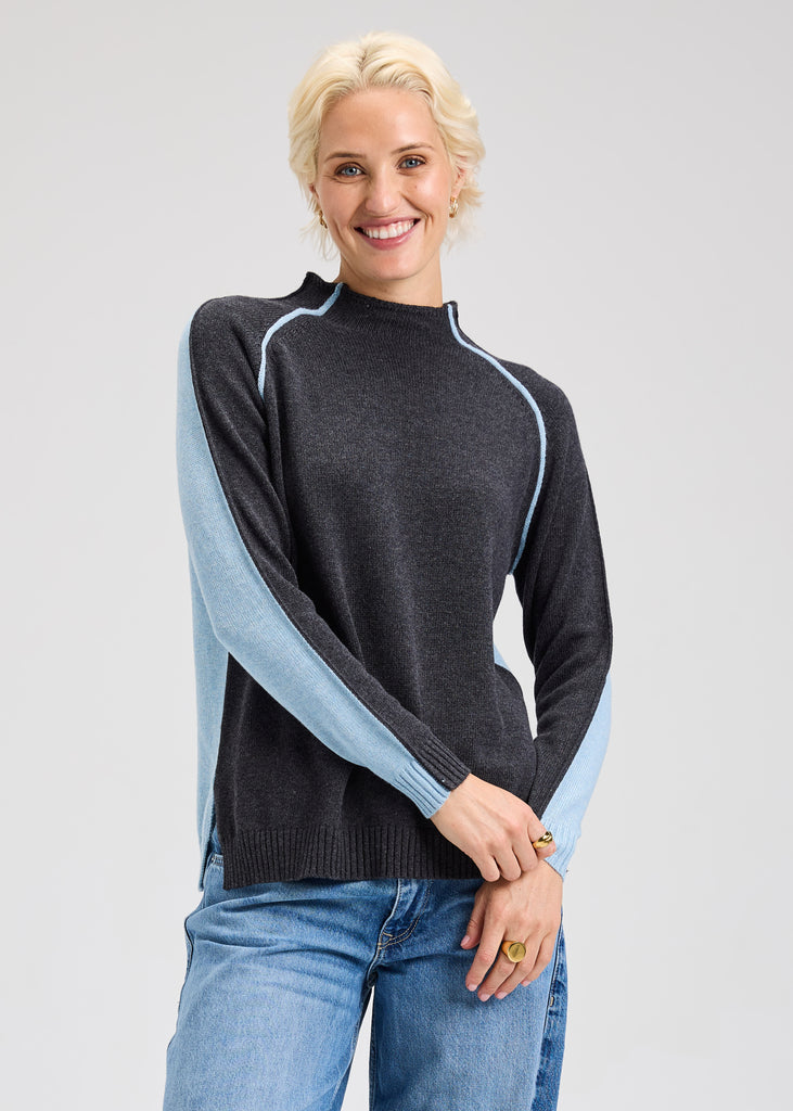 Two-sided reversible knit with relaxed fit and color block design