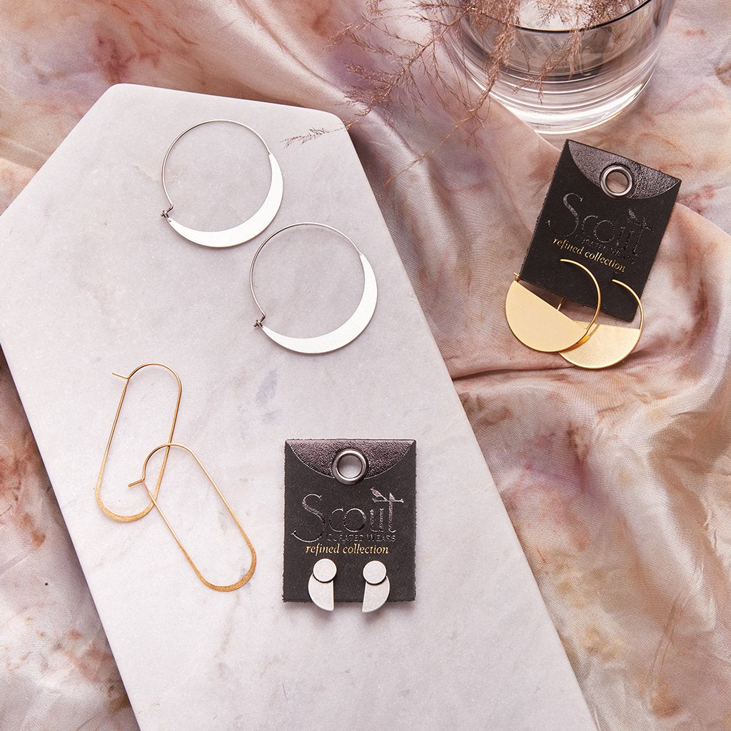 Scout curated wears hoop earrings